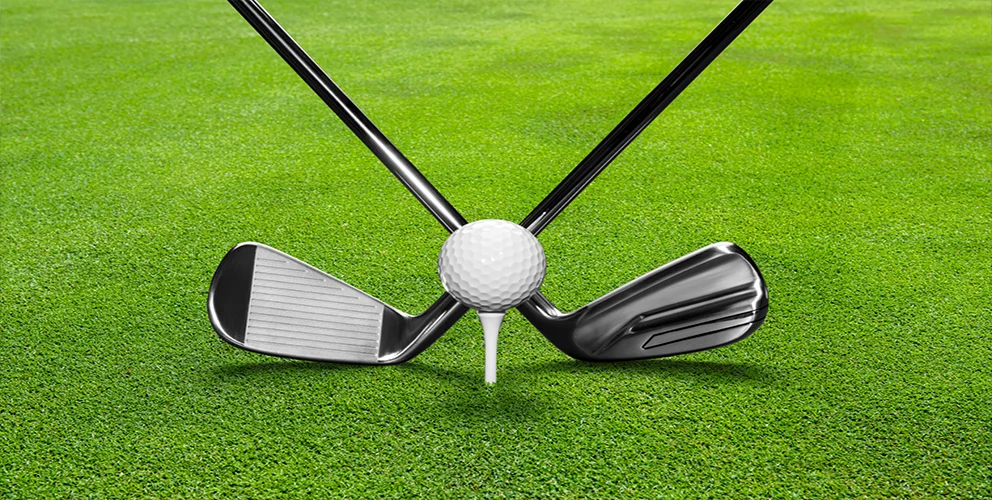 Image of two golf clubs forming a cross